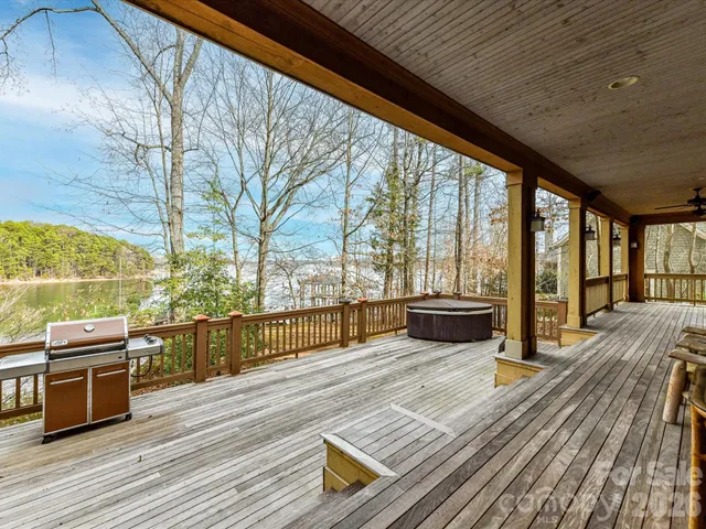 a view of a porch with wooden floor
