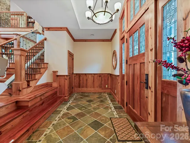 a view of entryway with a front door