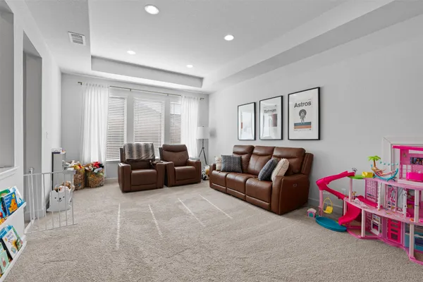 a living room with furniture and a couch