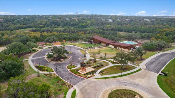 an aerial view of a swimming pool patio and mountain view