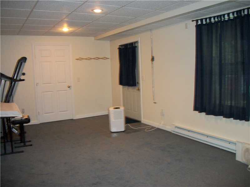 145 Deer Run Road Tiverton, RI 02878 - Photo 9 of 19 Den/Family/Great Room. Lower Level Family Room Walkout