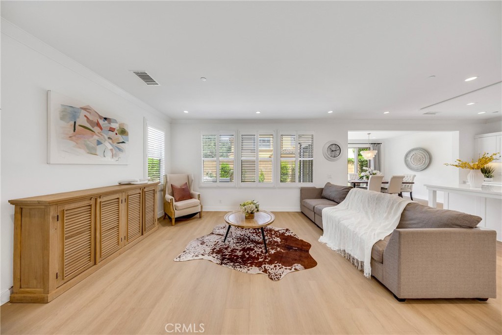 182 Frontier Irvine, CA 92620 - Photo 12 of 41 a living room with furniture and a wooden floor