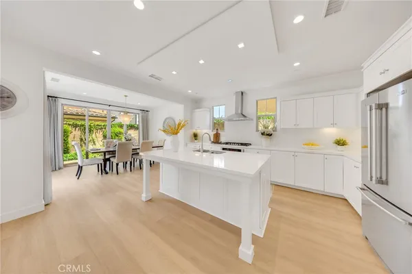 a view of kitchen with counter top space and stainless steel appliances