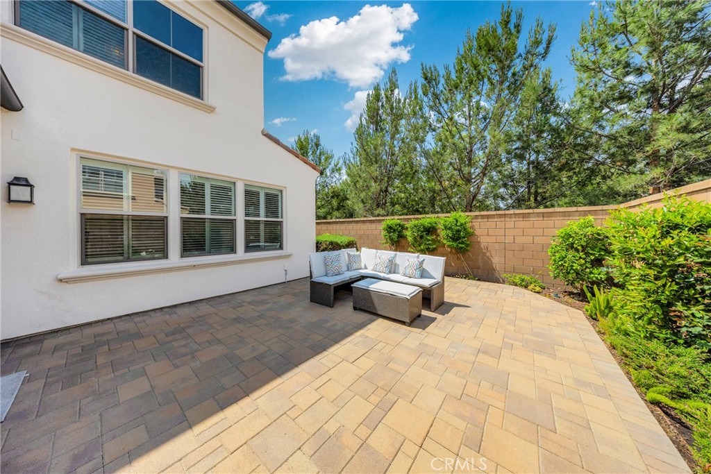 182 Frontier Irvine, CA 92620 - Photo 2 of 41 a balcony with couches and potted plants