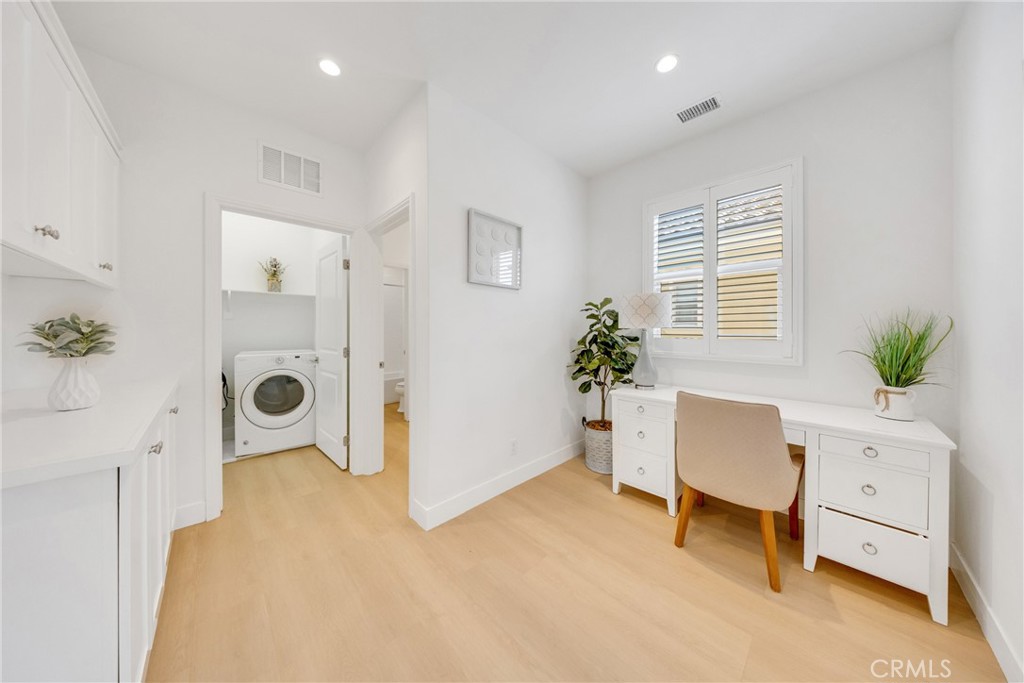 182 Frontier Irvine, CA 92620 - Photo 22 of 41 a view of livingroom with furniture and a potted plant