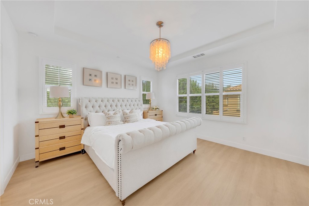 182 Frontier Irvine, CA 92620 - Photo 29 of 41 a bedroom with bed and a window