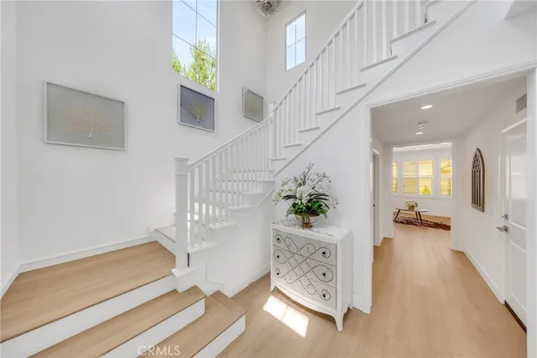 a view of hall way with furniture