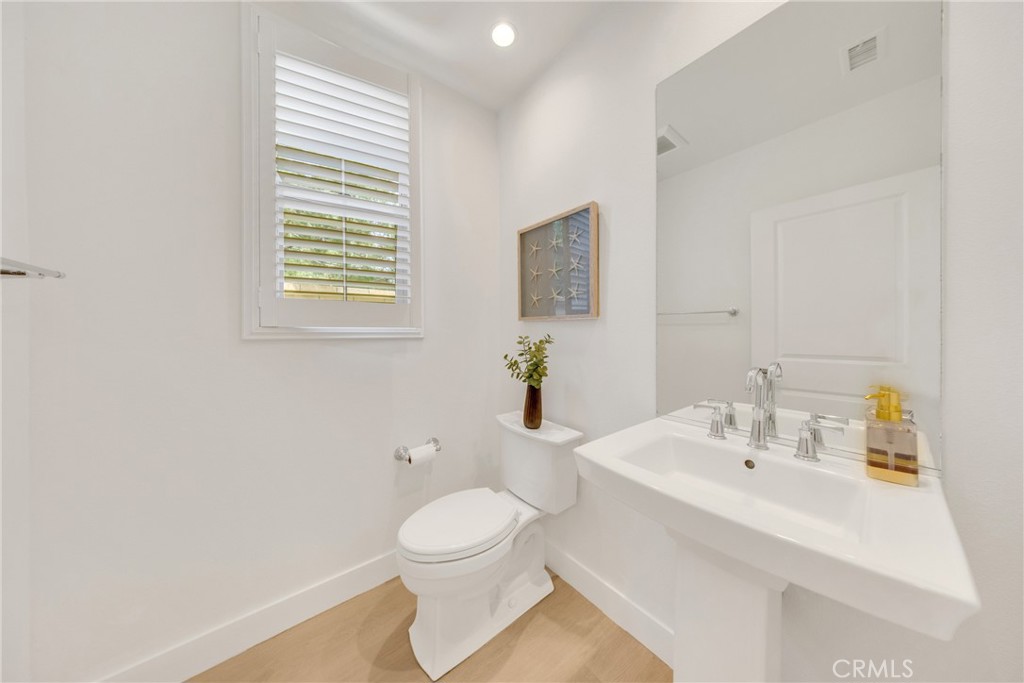 182 Frontier Irvine, CA 92620 - Photo 8 of 41 a bathroom with a sink a toilet and shower