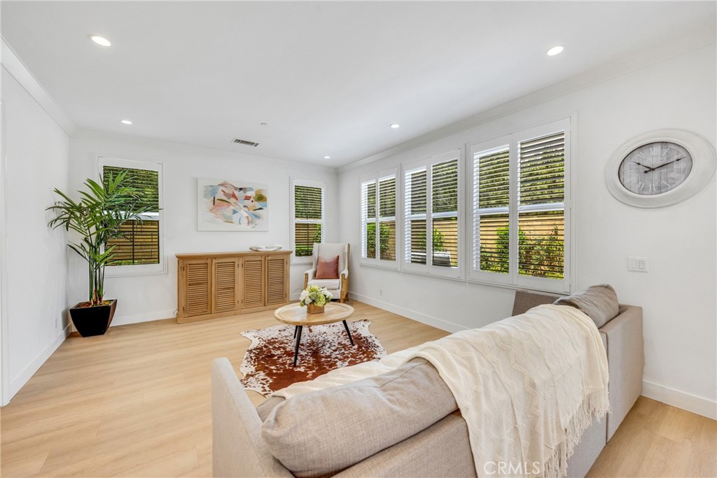 182 Frontier Irvine, CA 92620 - Photo 9 of 41 a living room with furniture and a large window