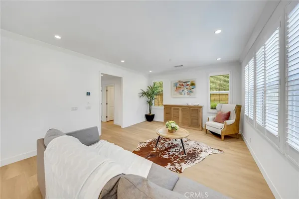 a bedroom with furniture or couch and a window