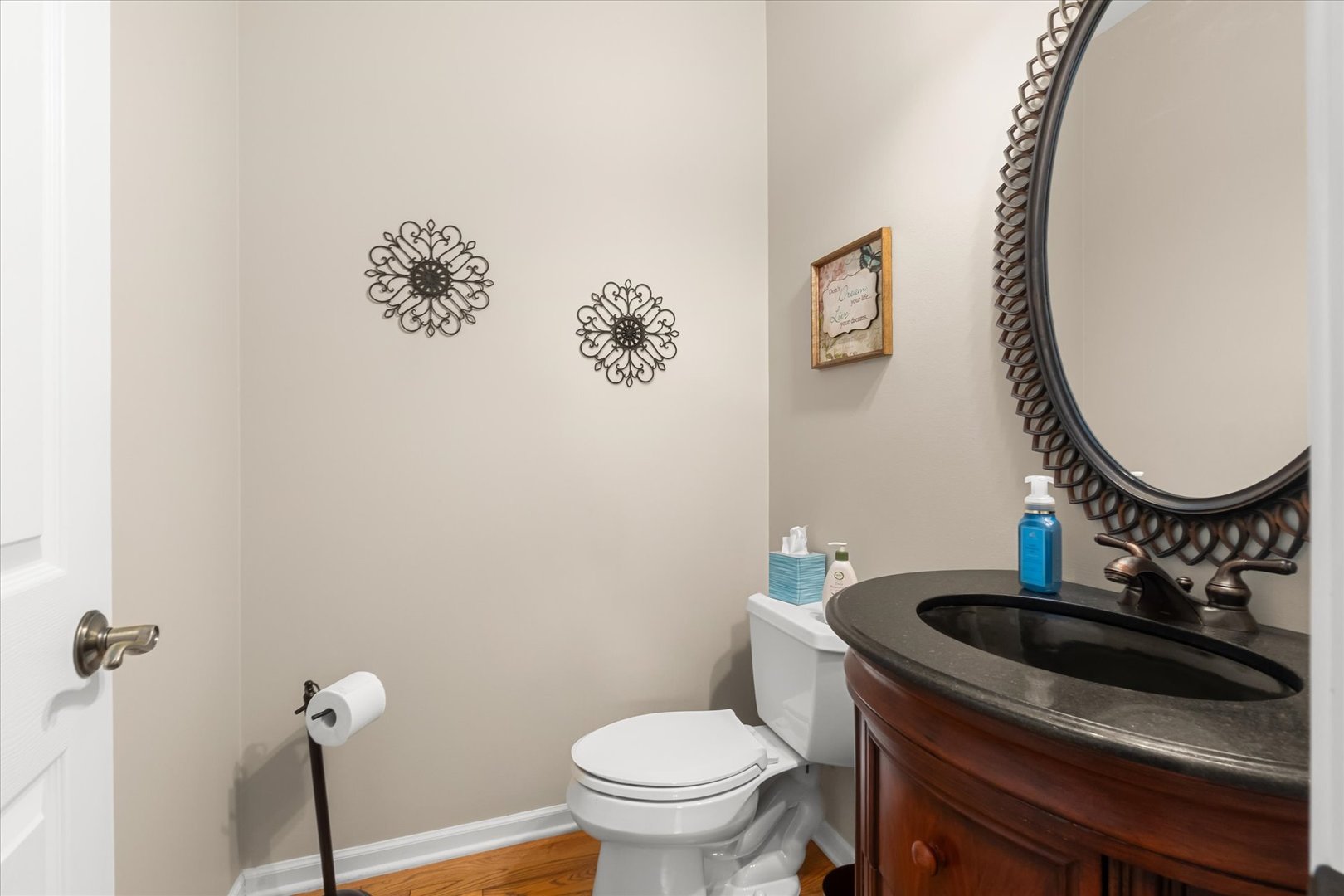 6 Winthrop New Road Sugar Grove, IL 60554 - Photo 16 of 38 a bathroom with a toilet a sink and mirror