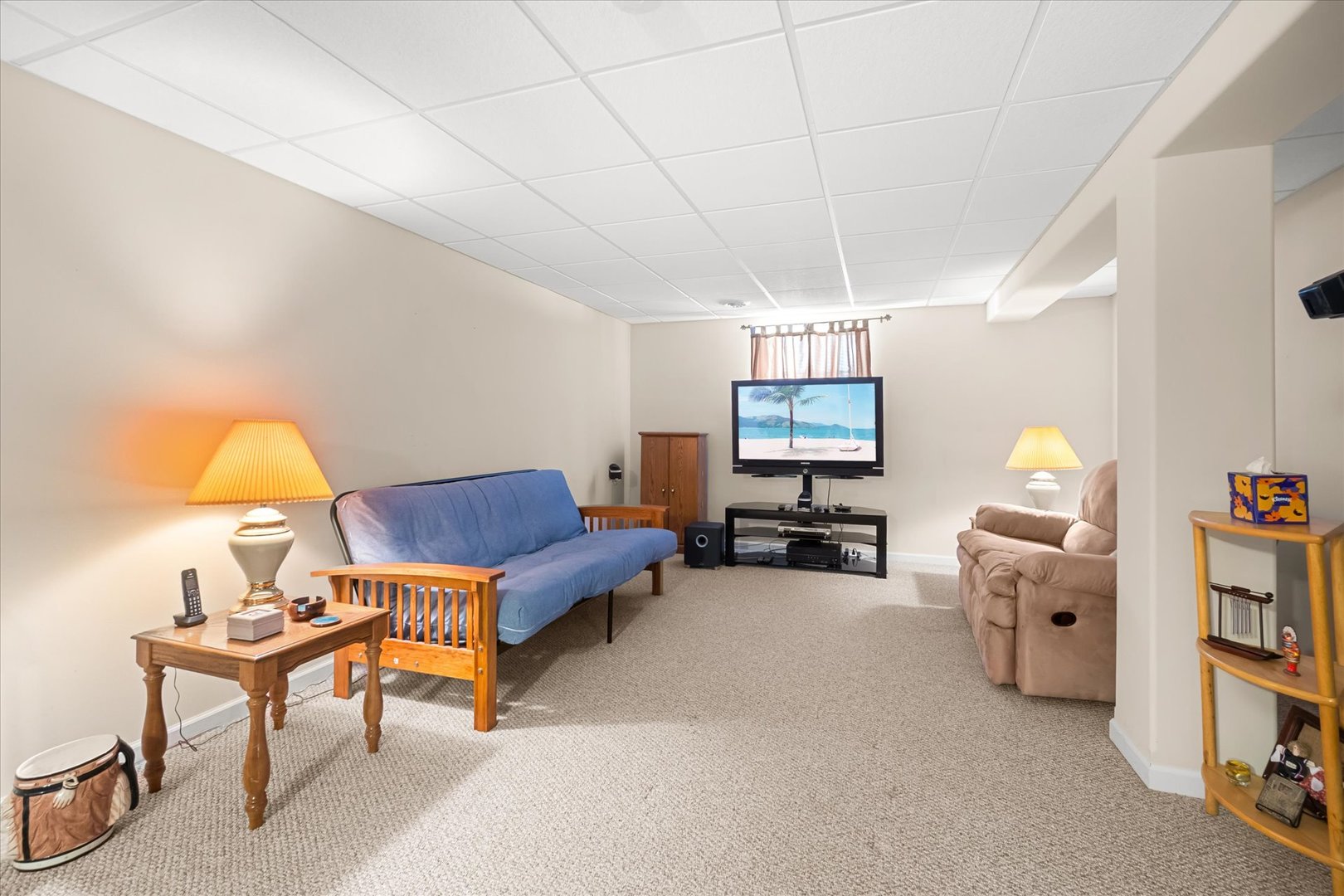 6 Winthrop New Road Sugar Grove, IL 60554 - Photo 22 of 38 a living room with furniture and a flat screen tv
