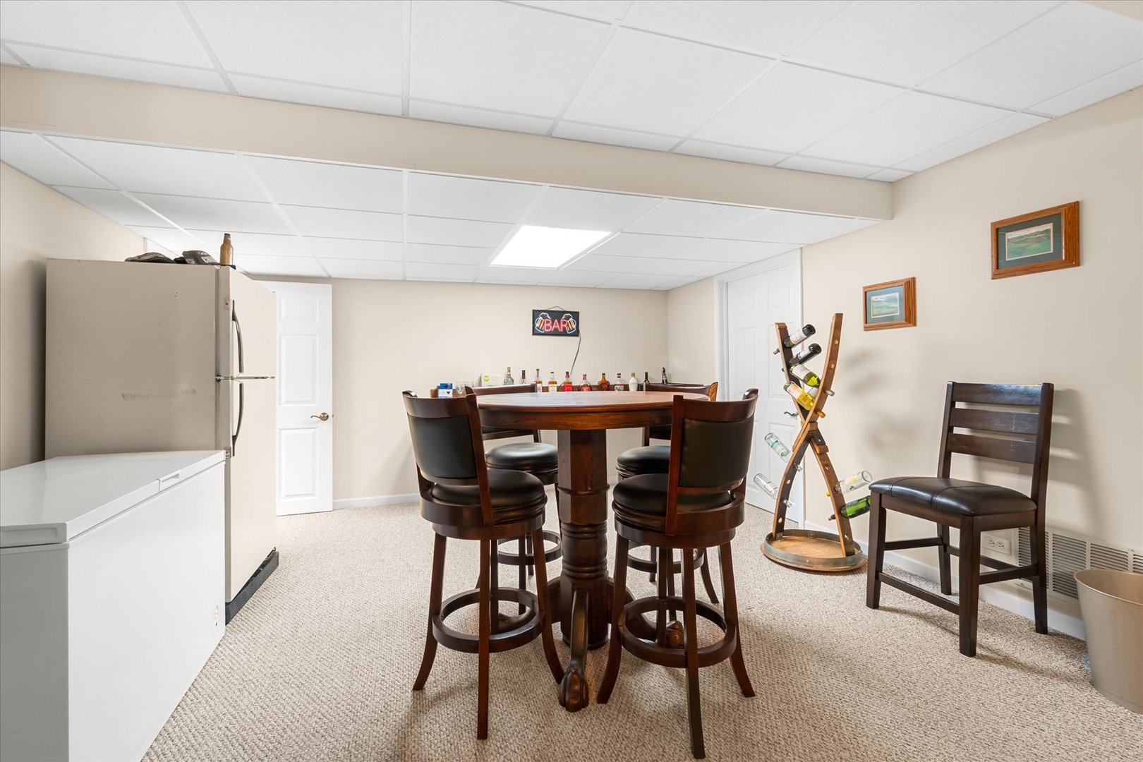 6 Winthrop New Road Sugar Grove, IL 60554 - Photo 23 of 38 a view of a dining room with furniture and a chandelier