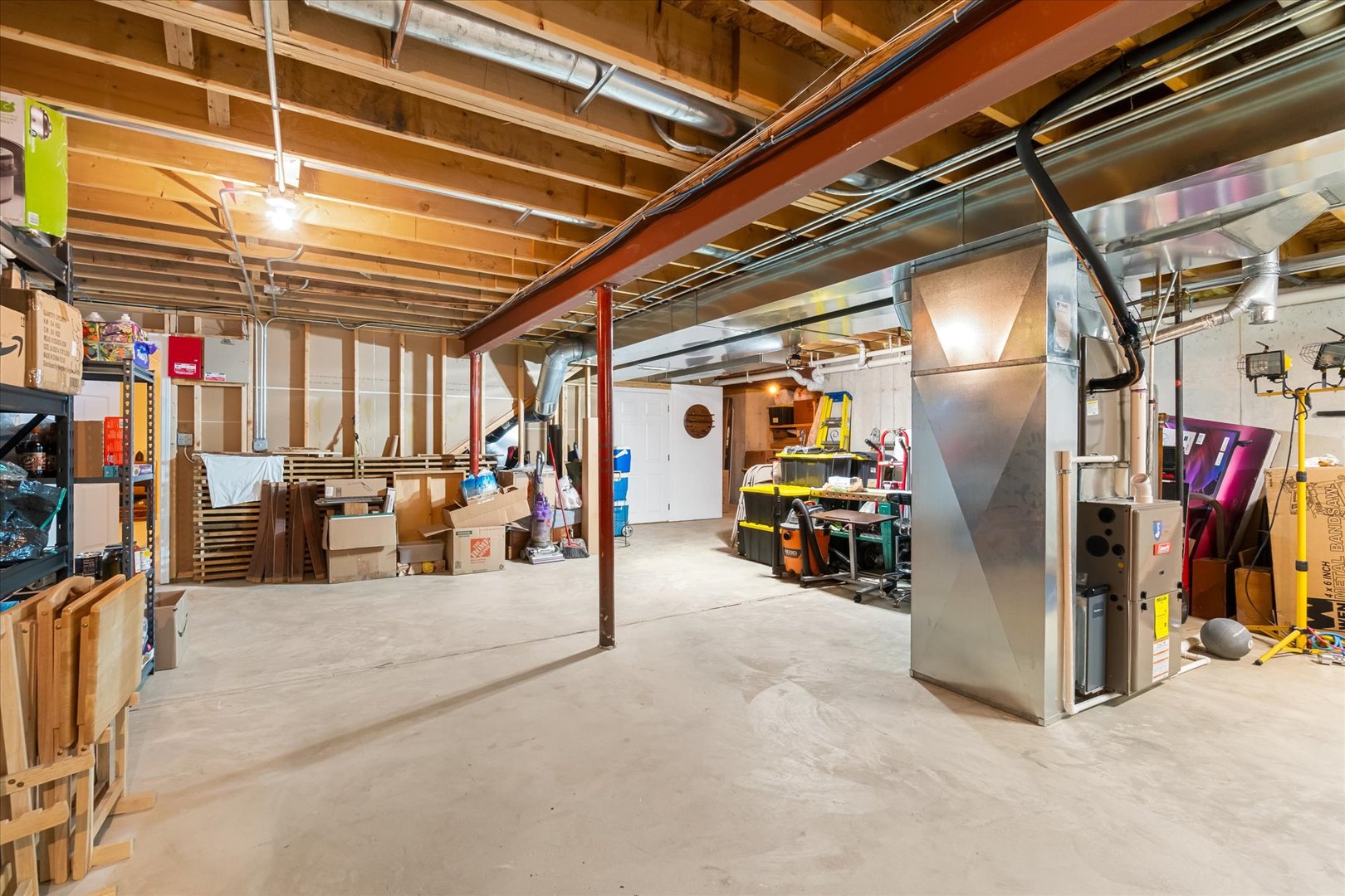 6 Winthrop New Road Sugar Grove, IL 60554 - Photo 26 of 38 a view of a garage with red chairs