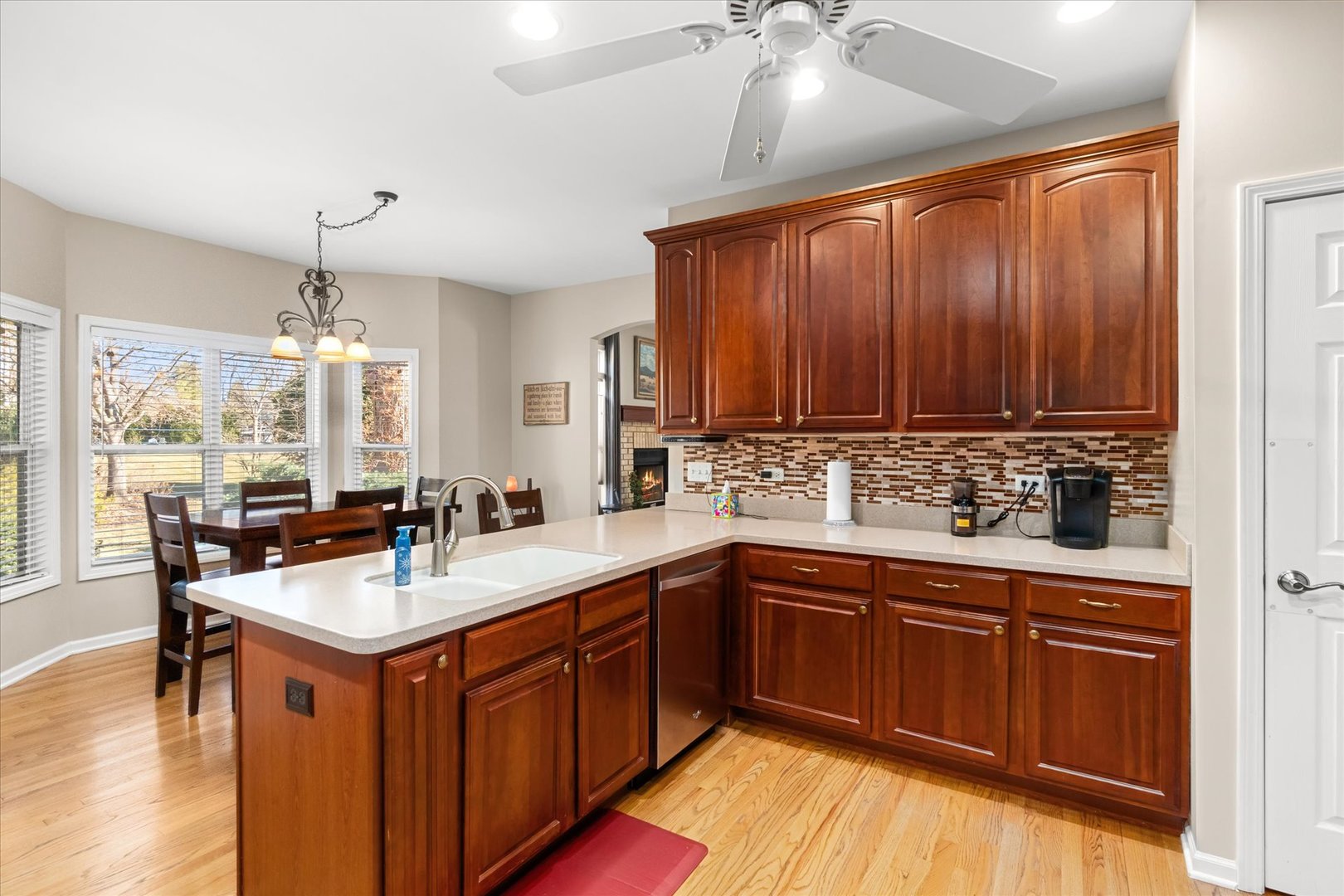 6 Winthrop New Road Sugar Grove, IL 60554 - Photo 9 of 38 a kitchen with a sink stove and cabinets
