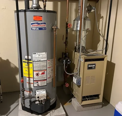 a room with water heater and storage
