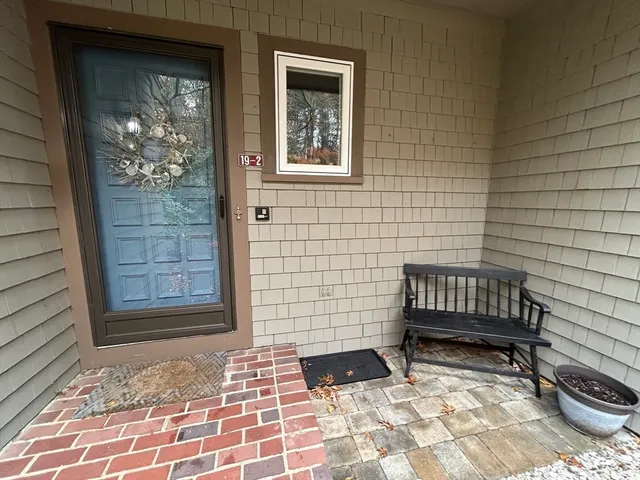 a view of a door with a chair