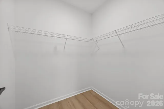 a view of a room with racks on the wall