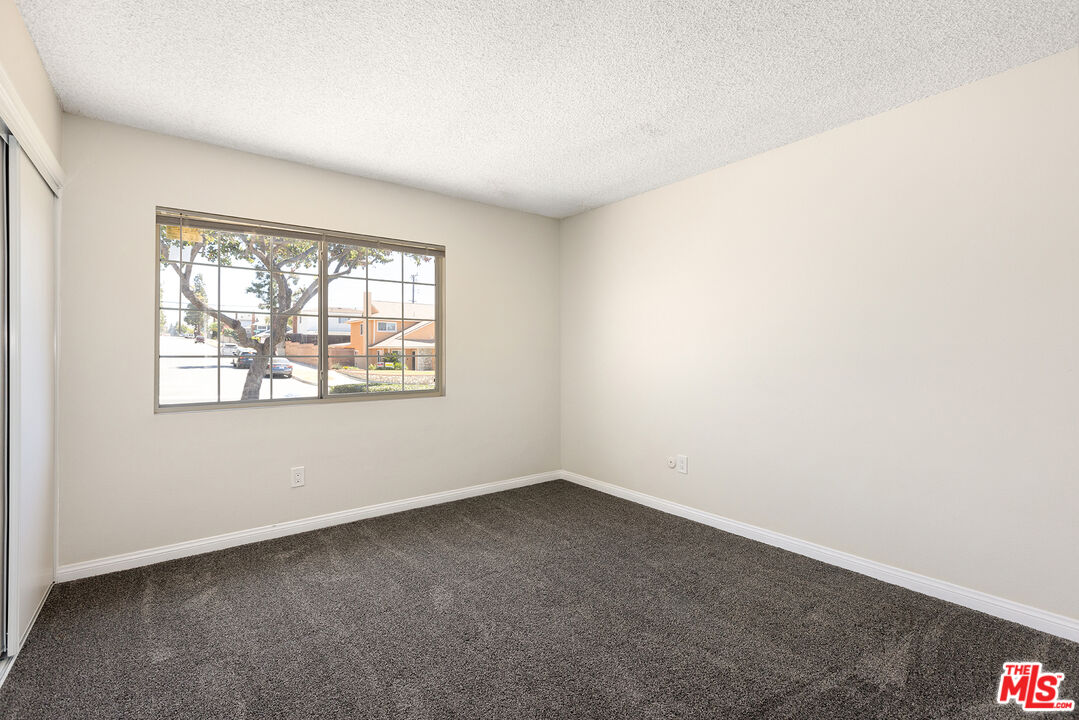 19115 Nestor Avenue Carson, CA 90746 - Photo 11 of 22 an empty room with a window