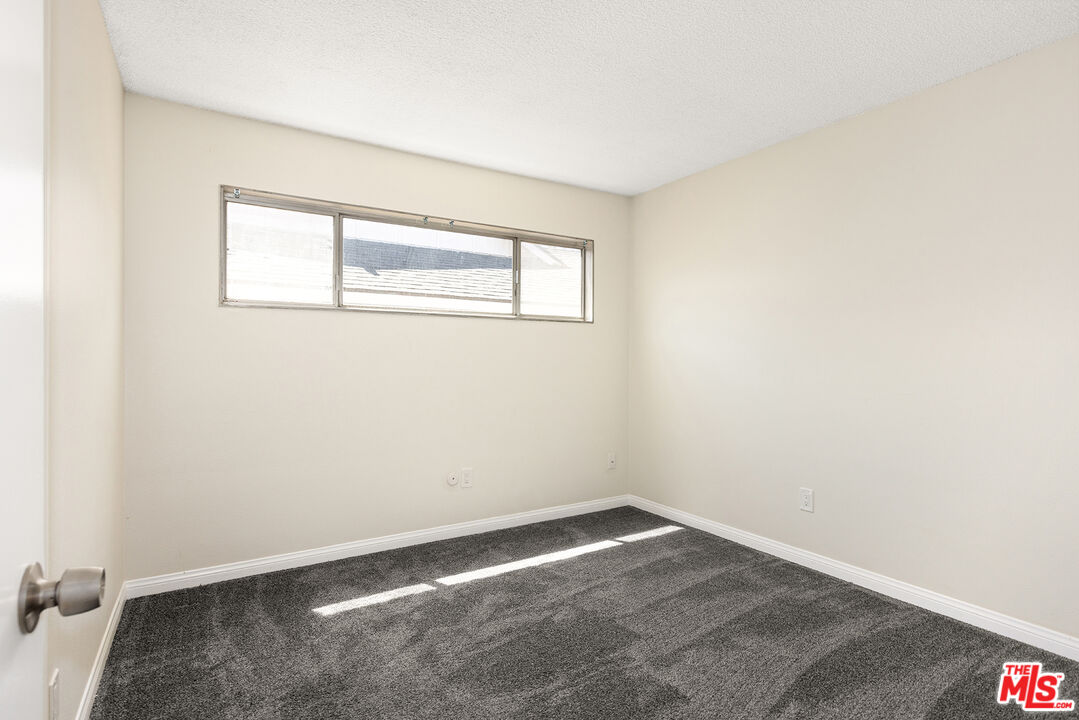 19115 Nestor Avenue Carson, CA 90746 - Photo 13 of 22 an empty room with a window