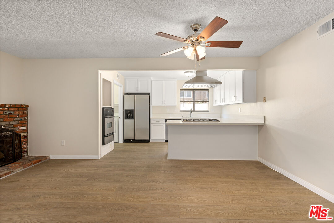 19115 Nestor Avenue Carson, CA 90746 - Photo 6 of 22 a view of a kitchen with a sink and cabinet