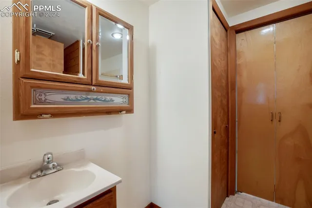 a view of staircase with wooden floor