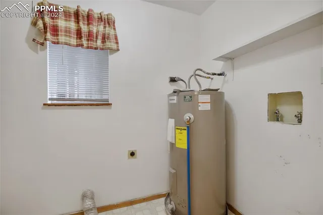 a view of a hallway with staircase