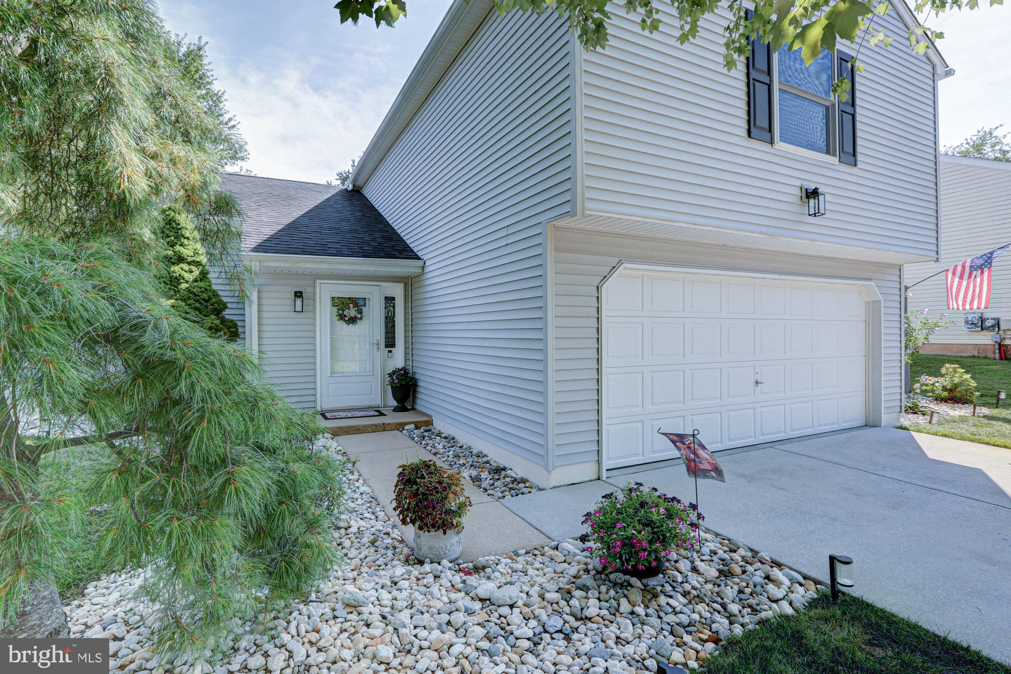 6 3 Rivers Drive Newark, DE 19702 - Photo 59 of 63 Charming curb appeal with vibrant landscaping.