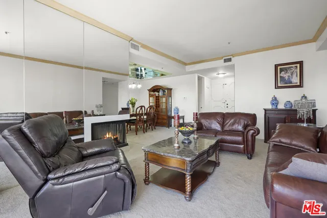 a bedroom with a bed and a table in it