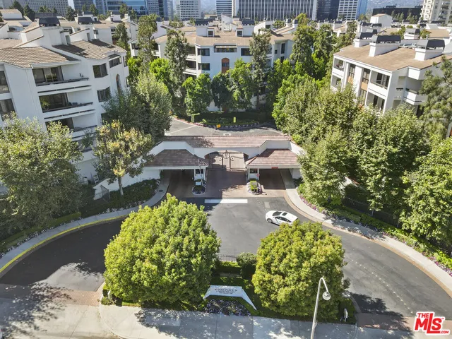 a view of a city with tall buildings