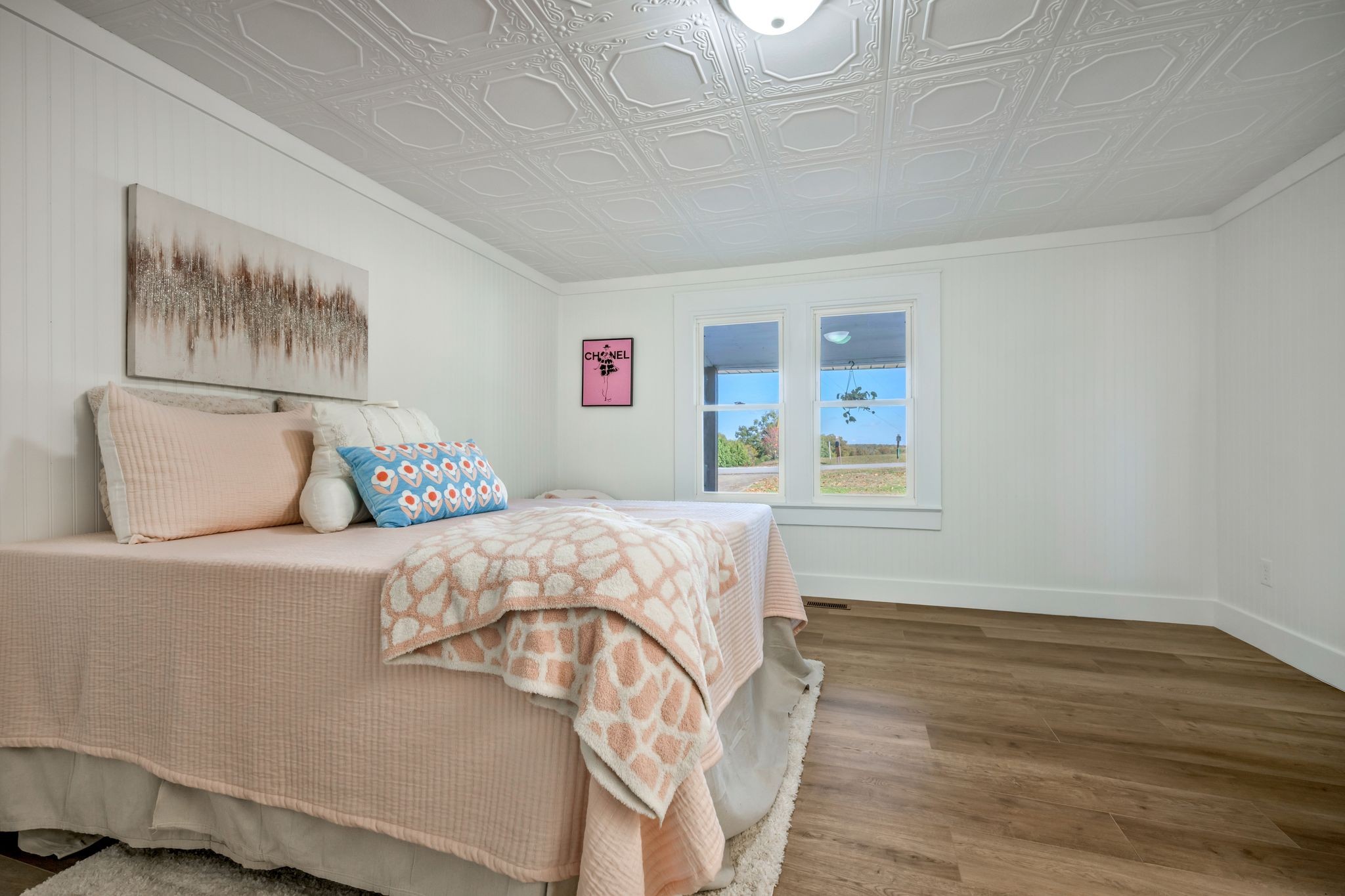 1865 Clydeton Road Waverly, TN 37185 - Photo 13 of 40 a bedroom with a bed and wooden floor