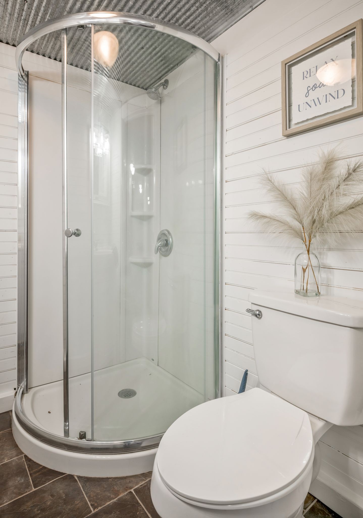 1865 Clydeton Road Waverly, TN 37185 - Photo 22 of 40 a bathroom with a toilet and a shower