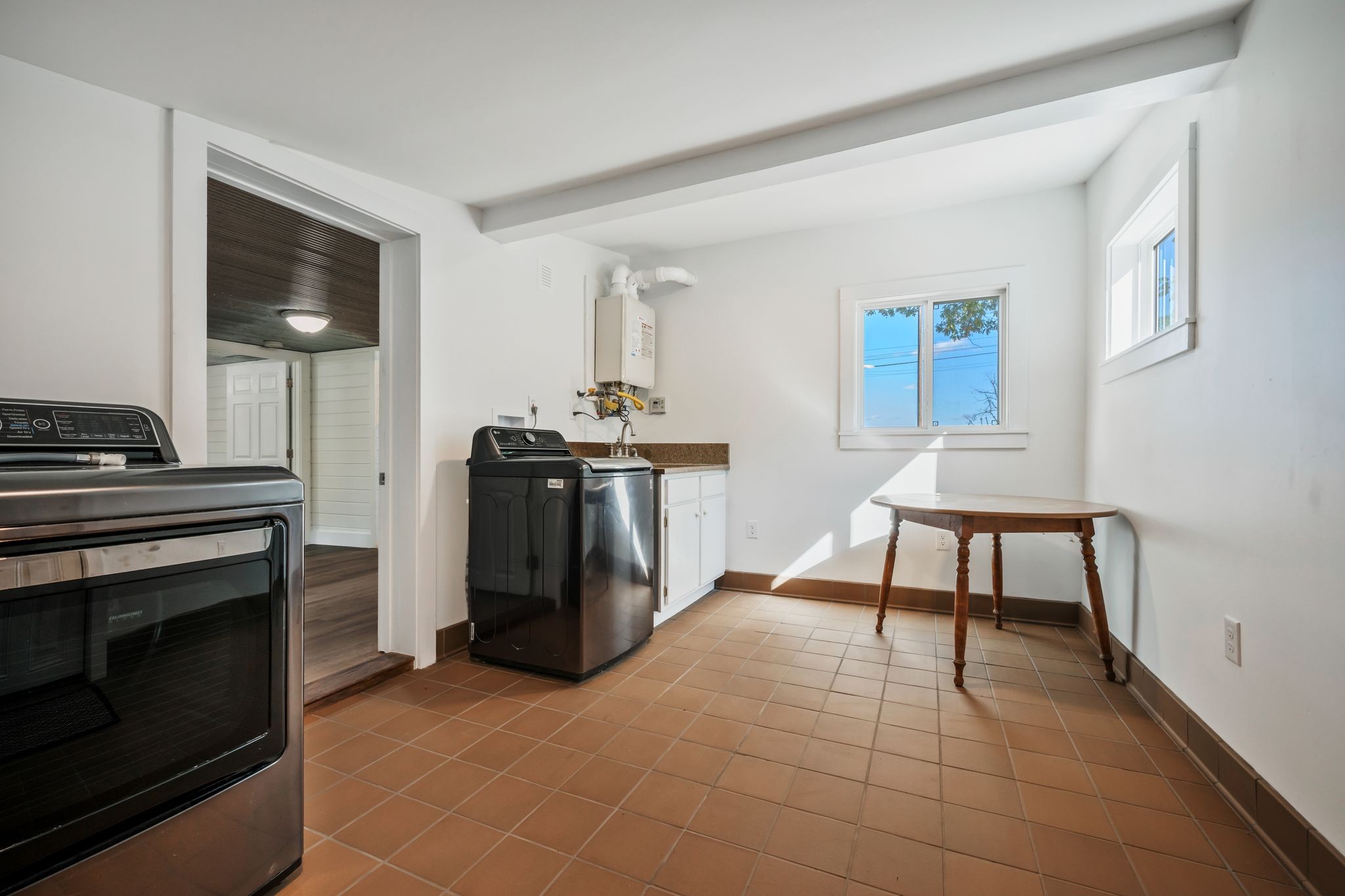1865 Clydeton Road Waverly, TN 37185 - Photo 24 of 40 a living room with furniture a flat screen tv and a fireplace