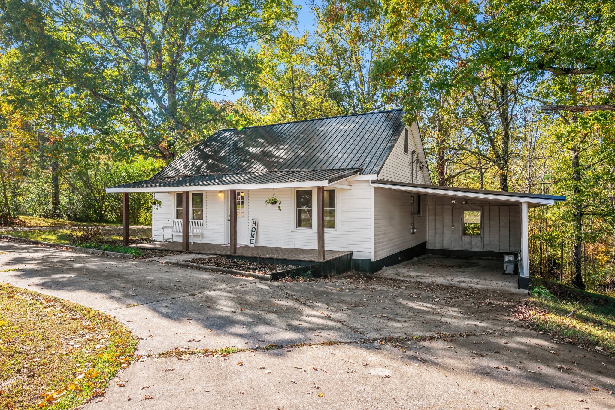 1865 Clydeton Road Waverly, TN 37185 - Photo 26 of 40 a front view of a house with a yard