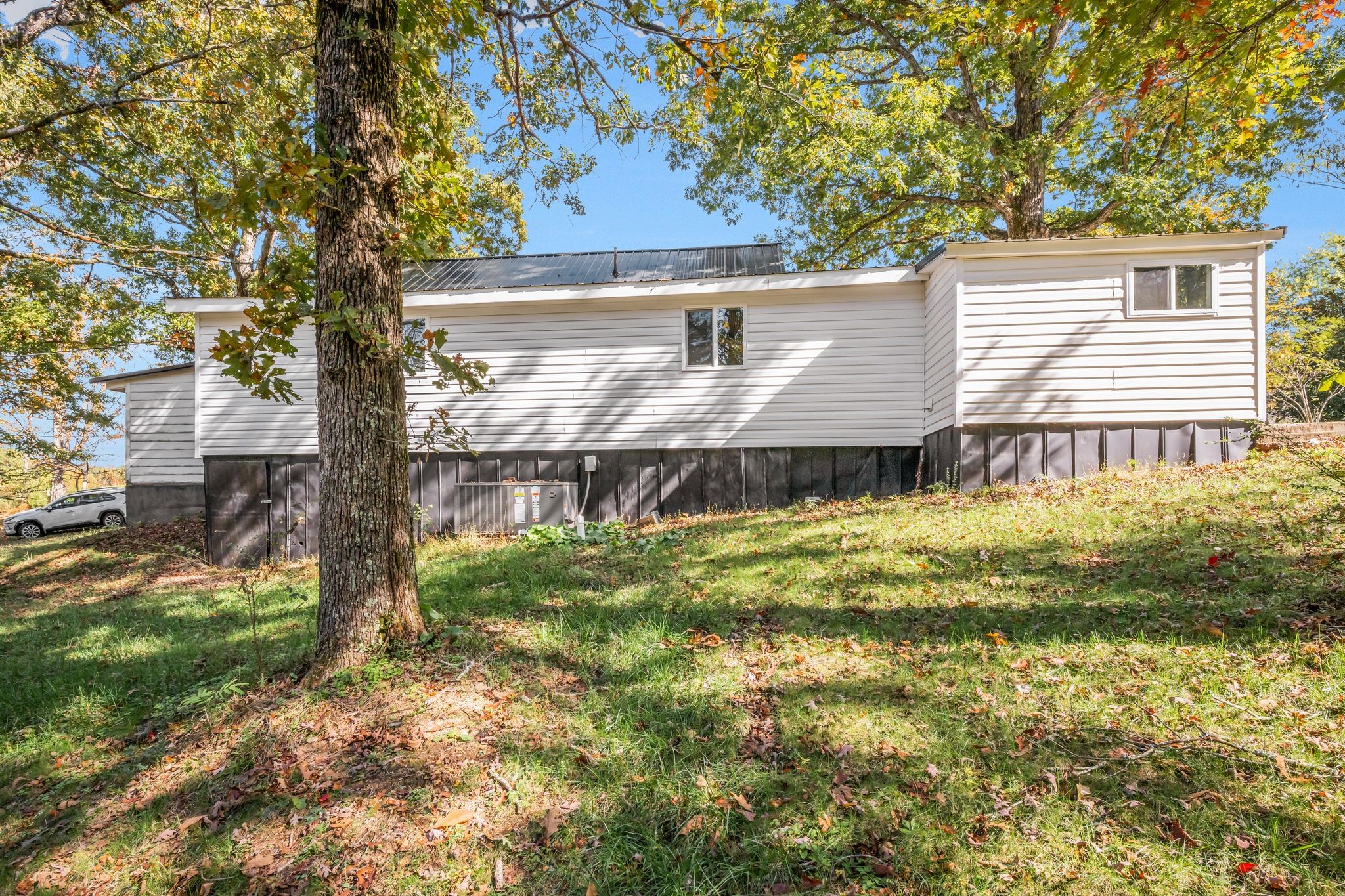 1865 Clydeton Road Waverly, TN 37185 - Photo 29 of 40 a view of a house with a yard