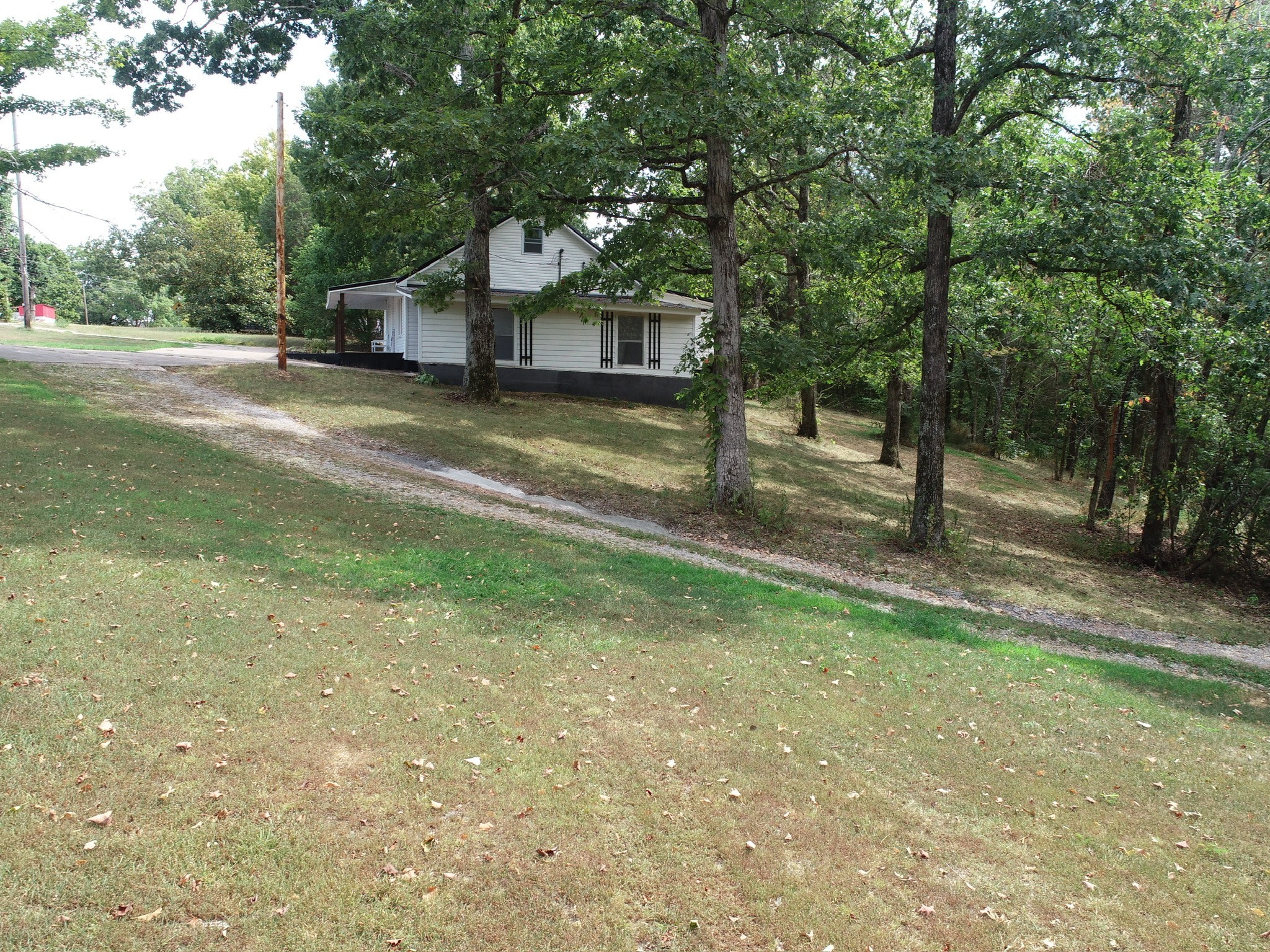 1865 Clydeton Road Waverly, TN 37185 - Photo 36 of 40 a view of a house with a yard