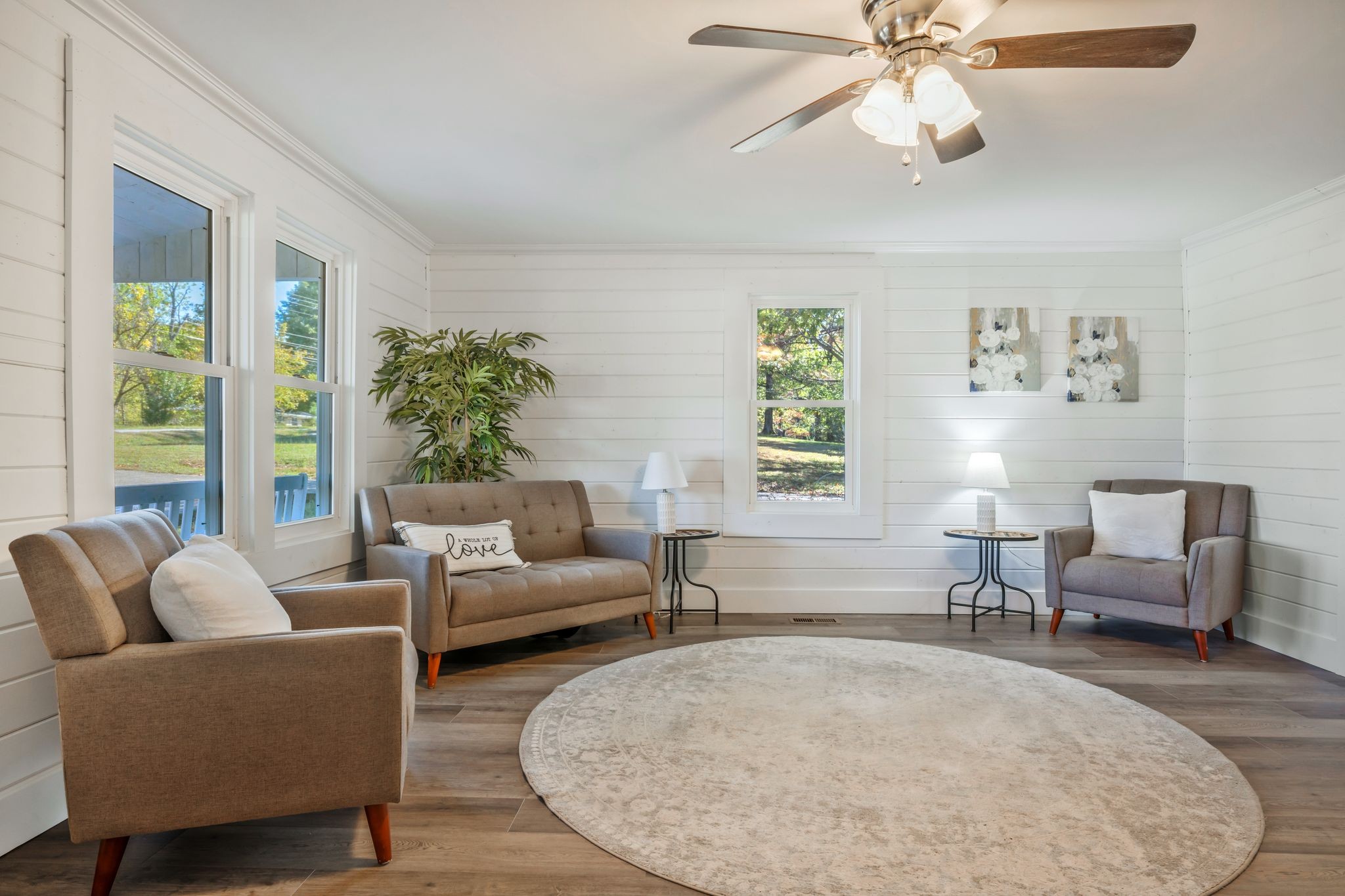 1865 Clydeton Road Waverly, TN 37185 - Photo 6 of 40 a living room with furniture and a large window