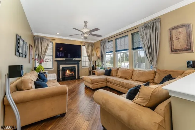 a bathroom with a sink a toilet a mirror and shower