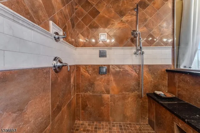 a front view of a house with a yard table and chairs