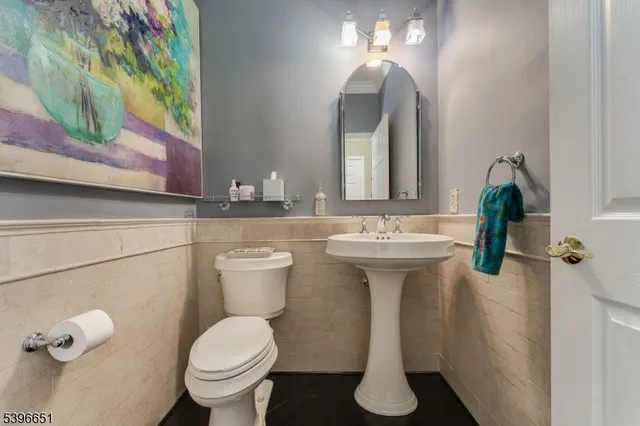 a bathroom with a shower and a sink