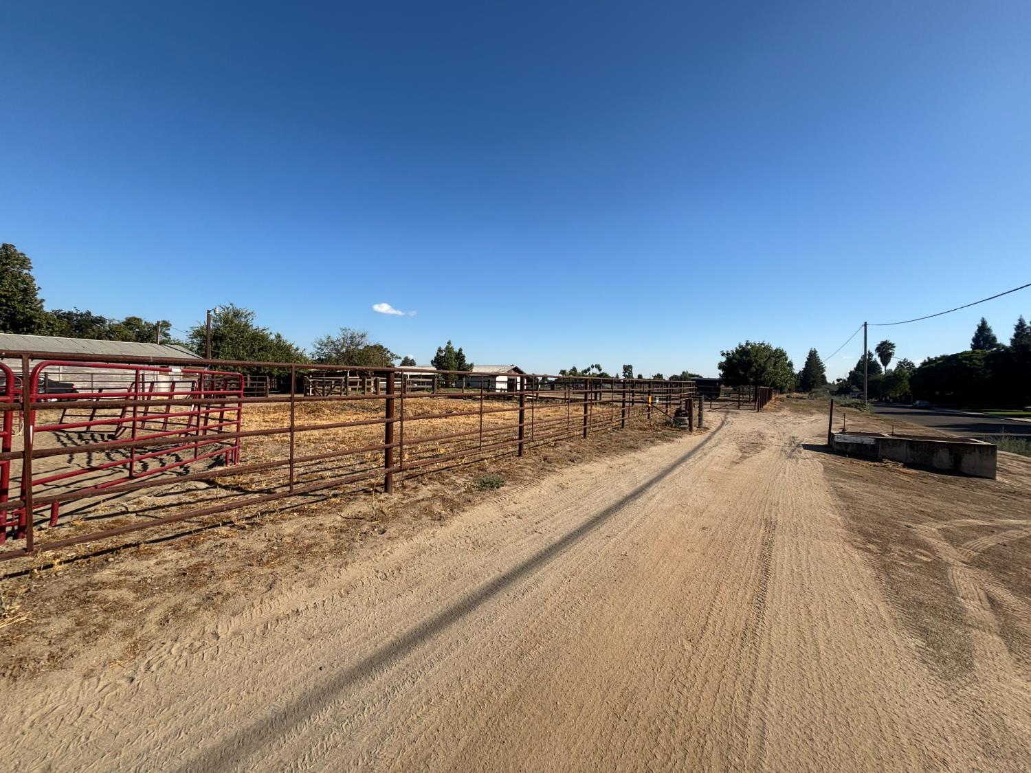 19317 East Parlier Avenue Reedley, CA 93654 - Photo 32 of 36 a view of a swimming pool with a yard
