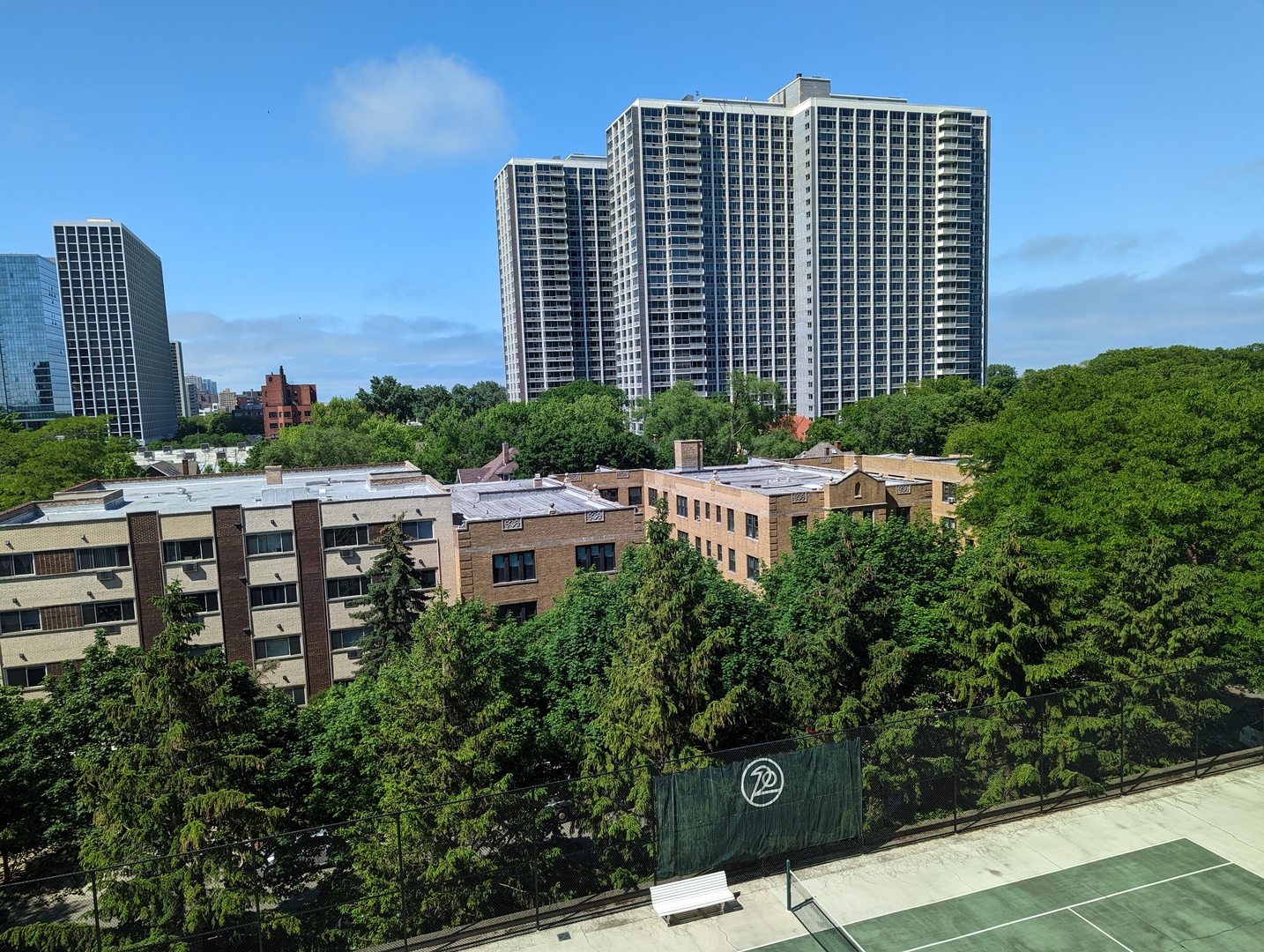 720 West Gordon Terrace, Unit 7J Chicago, IL 60613 - Photo 7 of 14 a view of a city with tall buildings