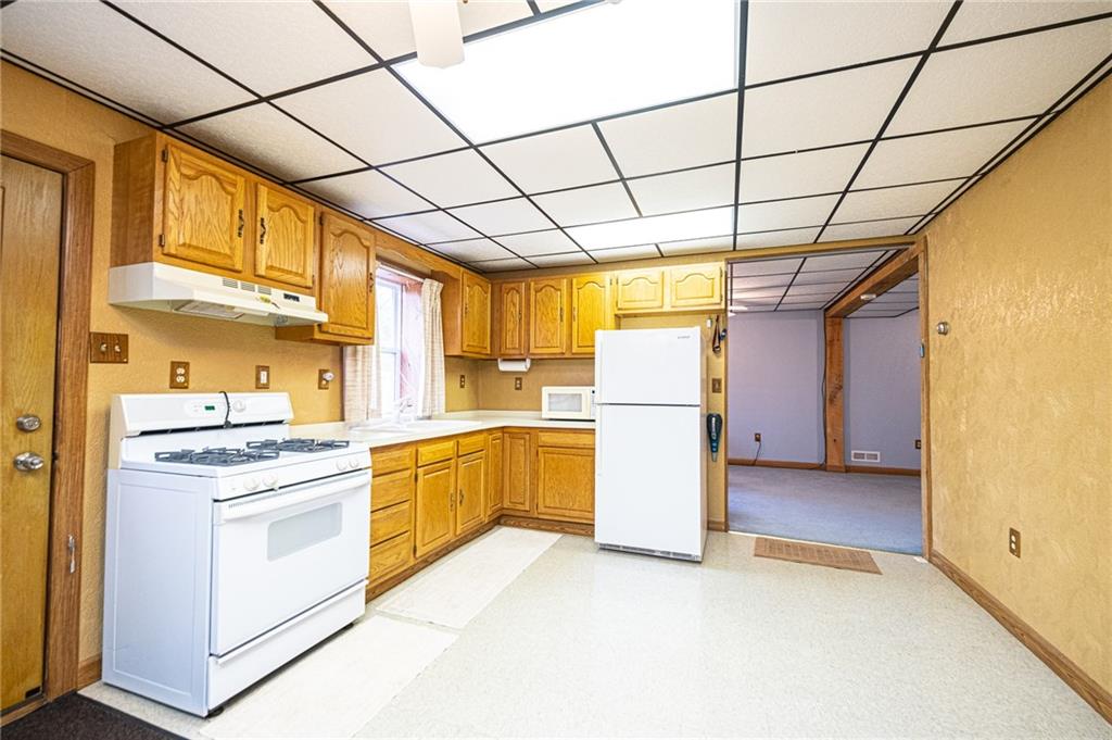 341 Pittsburgh Grade Road Hookstown, PA 15050 - Photo 14 of 23 Second Kitchen in Lower Level includes a gas stove (no propane for this stove) and second refrigerator.