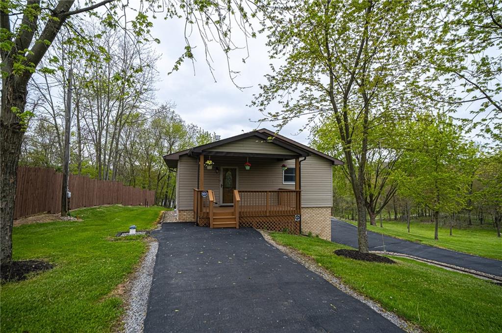 341 Pittsburgh Grade Road Hookstown, PA 15050 - Photo 3 of 23 Entry to the Main Level with an Inviting Covered Front Porch. Paved Driveway.