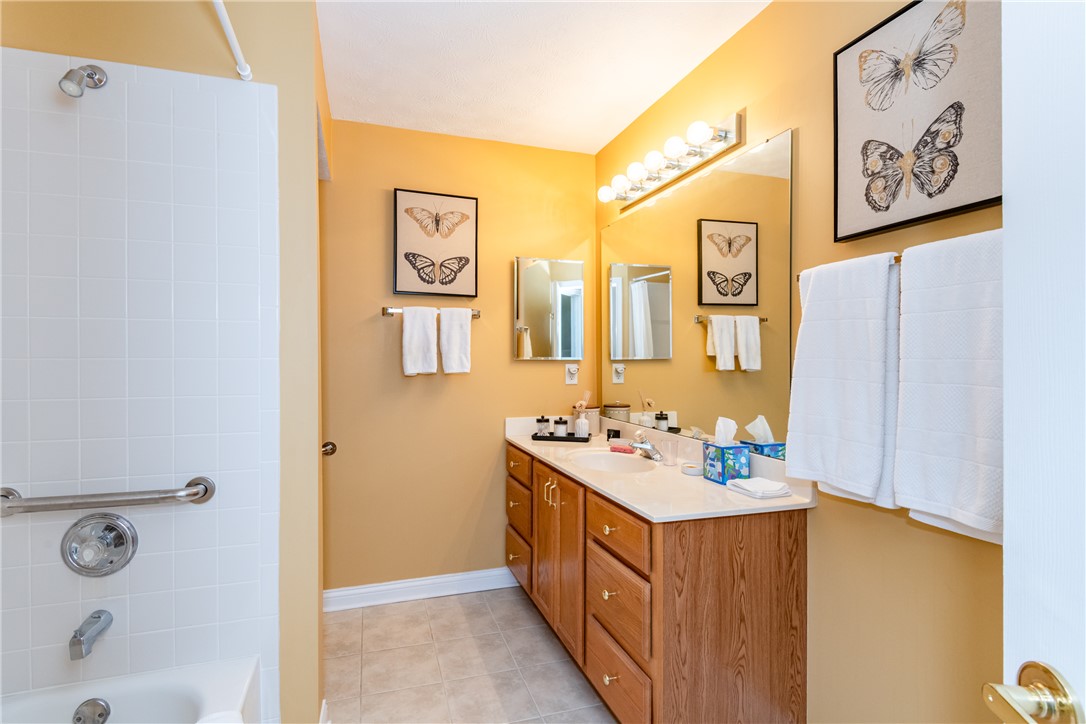 1105 Napa Ridge Dayton, OH 45458 - Photo 27 of 58 This bright bathroom features a spacious vanity and practical tile flooring.