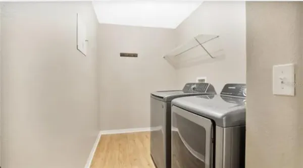 a utility room with dryer and washer