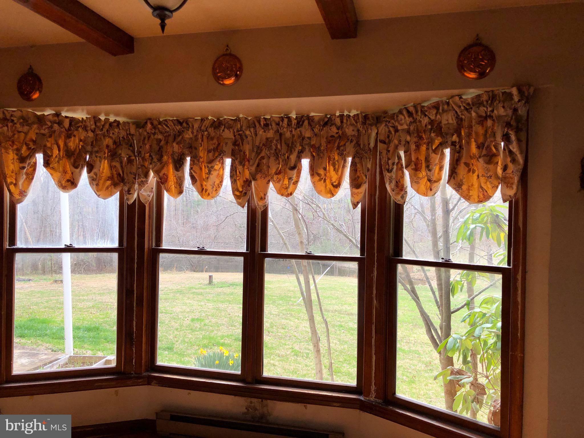 882 Scrabble Road Castleton, VA 22716 - Photo 14 of 17 Bay window in kitchen looks towards ponds