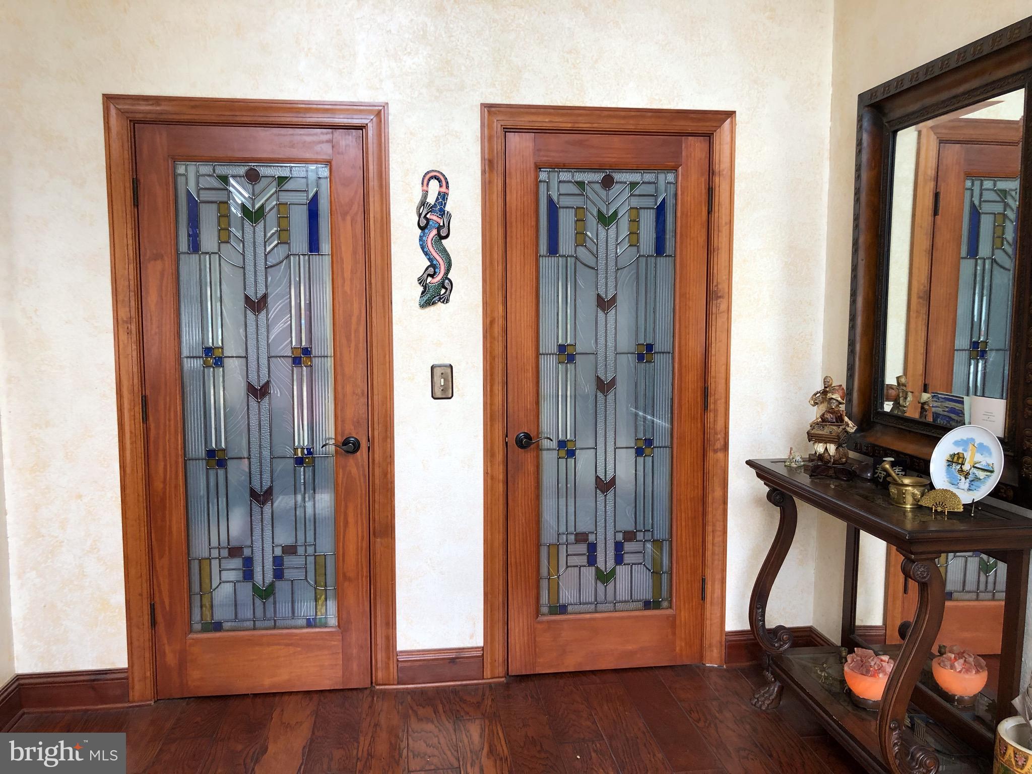 882 Scrabble Road Castleton, VA 22716 - Photo 17 of 17 Leaded closet doors in entrance hall