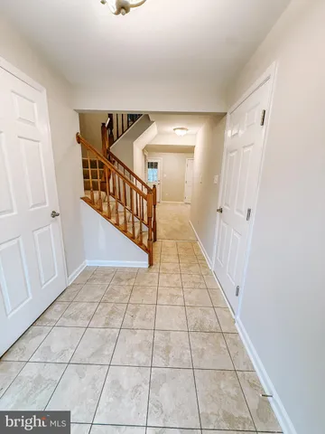 a view of an entryway with stairs