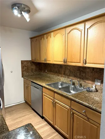 a view of room with window and hardwood floor